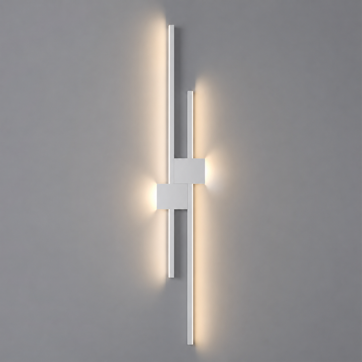 Applique murale LED linéaire Luminaire Essenza, lumière architecturale épurée en noir ou blanc, pour décoration moderne.