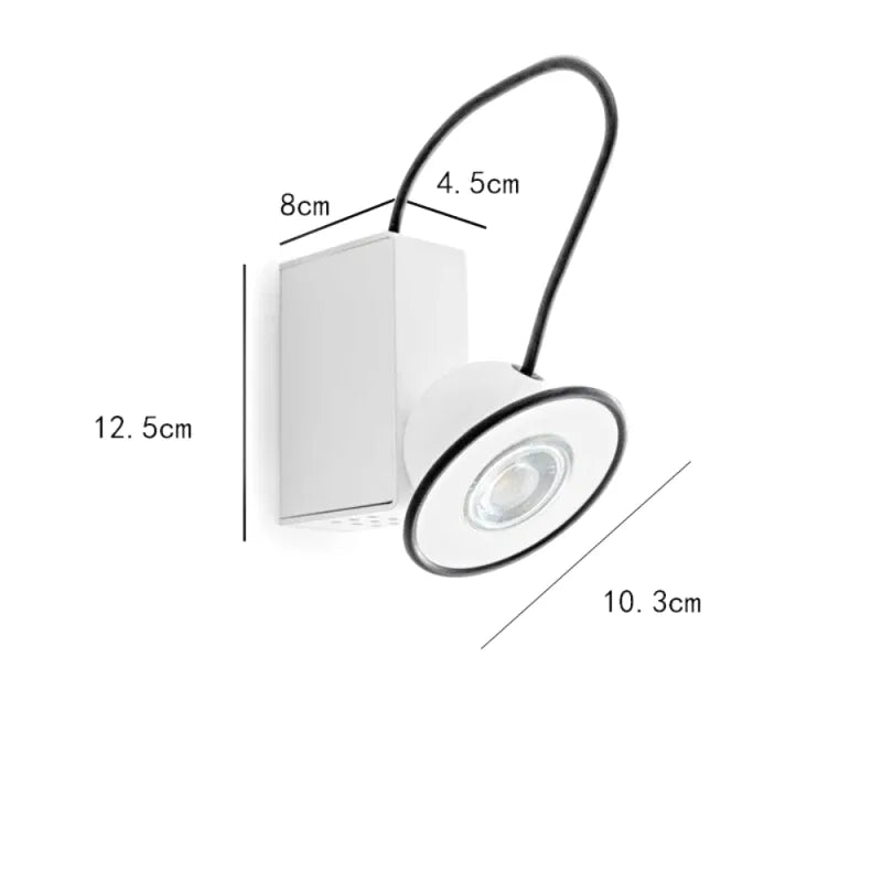 Applique murale couloir LED magnétique Luminaire Essenza avec lumière moderne et design épuré, fixée au mur.