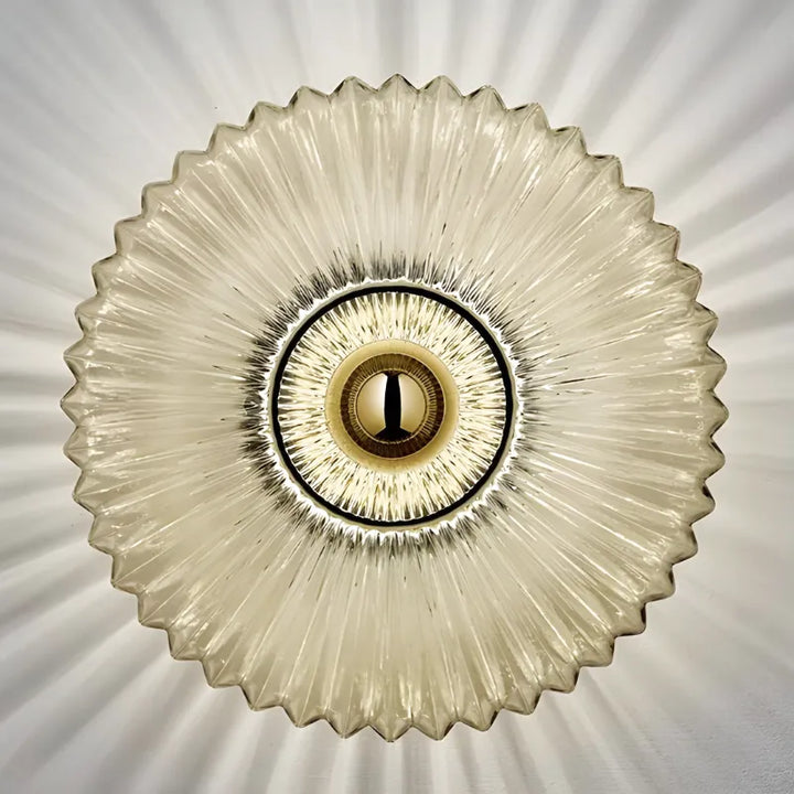 Applique murale décorative en verre en forme de cercle blanc chaud par Luminaire Essenza, éclairage moderne pour intérieur.