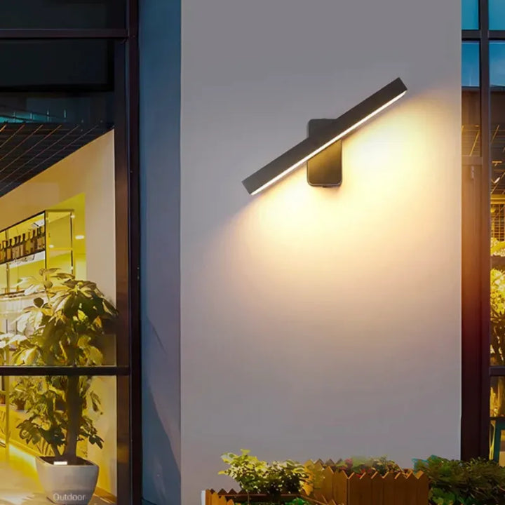 Applique murale LED extérieure Luminaire Essenza, design moderne minimaliste, 20 cm, blanc chaud, pour éclairage extérieur.