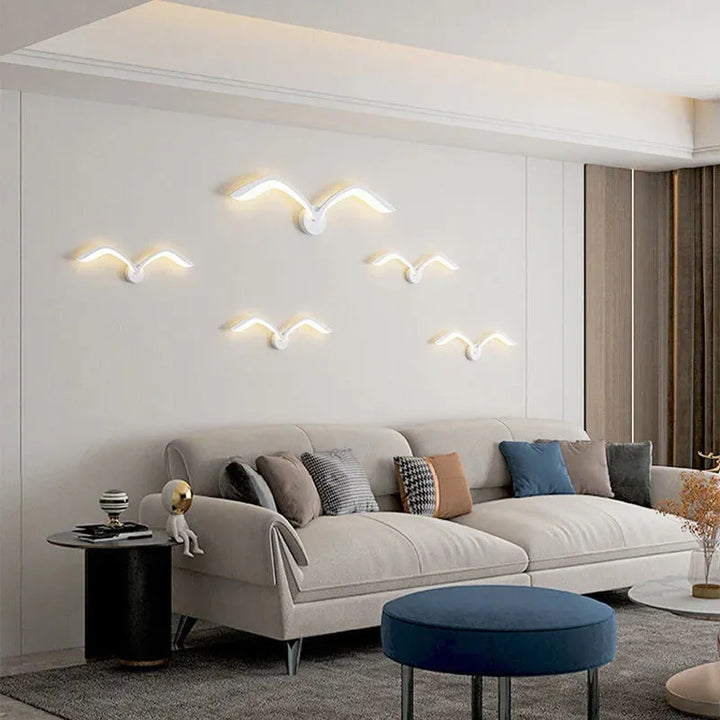 Applique murale LED nordique Luminaire Essenza avec design oiseau blanc, lumière chaude pour décoration intérieure.