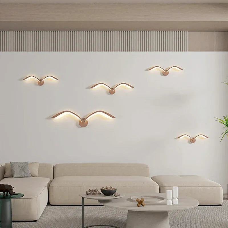 Applique murale LED nordique en forme d'oiseau blanc avec lumière chaude, de marque Luminaire Essenza.