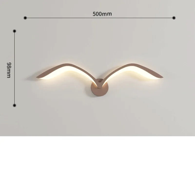 Applique murale LED nordique en forme d'oiseau blanc avec lumière chaude, design moderne et élégant pour décoration intérieure.