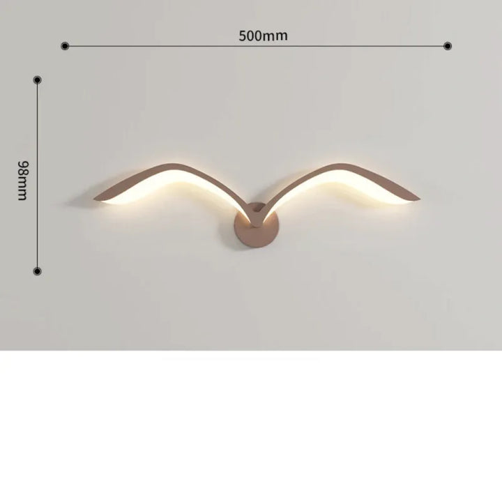 Applique murale LED nordique en forme d'oiseau blanc avec lumière chaude, design moderne et élégant pour décoration intérieure.