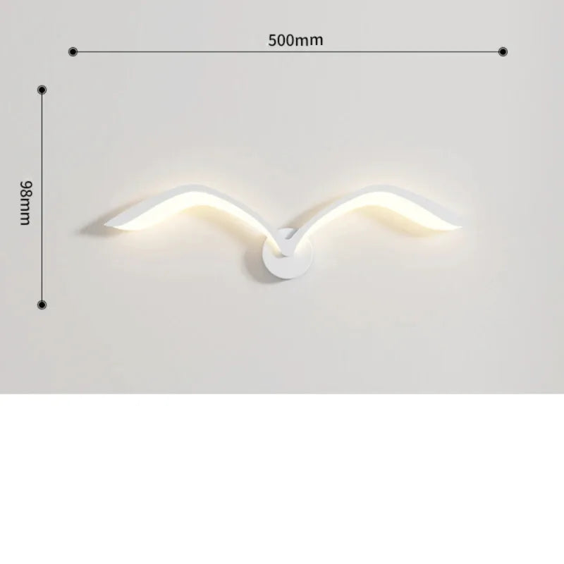 Applique murale LED nordique en forme d'oiseau blanc avec lumière chaude, design minimaliste et moderne, par Luminaire Essenza.