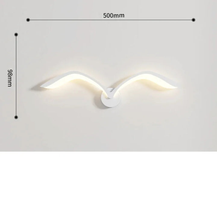 Applique murale LED nordique en forme d'oiseau blanc avec lumière chaude, design minimaliste et moderne, par Luminaire Essenza.
