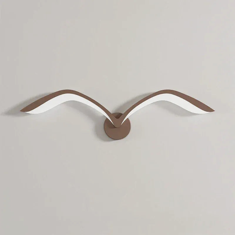 Applique murale LED nordique en forme d'oiseau avec finition marron et lumière blanche chaude, design moderne de Luminaire Essenza.