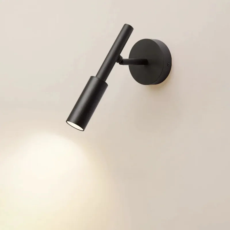 Applique murale LED vintage moderne réglable noire de la marque Luminaire Essenza, éclairage d'ambiance élégant et contemporain.