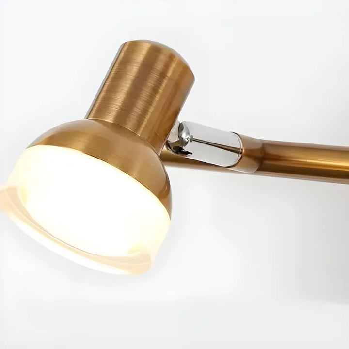 Applique murale salle de bain LED rotative moderne Luminaire Essenza avec trois têtes en or et blanc naturel.